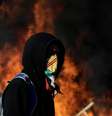 Manifestante durante protesto contra o governo chileno em Concepción
06/11/2019
REUTERS/Juan Gonzalez  Foto: Reuters