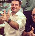 O então deputado Flávio Bolsonaro com seu assessor Fabrício Queiroz  Foto: Reprodução / Estadão Conteúdo