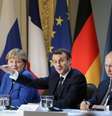Presidentes da Ucrânia, Volodymyr Zelenskiy, da França, Emmanuel Macron, e da Rússia, Vladimir Putin, e a chanceler alemã, Angela Merkel, dão entrevista coletiva após renião em Paris
09/12/2019
Ludovic Marin/Pool via REUTERS  Foto: Reuters