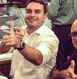 O então deputado Flávio Bolsonaro com seu assessor Fabrício Queiroz  Foto: Reprodução / Estadão Conteúdo