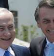 Jair Bolsonaro visitou o Muro das Lamentações ao lado de Benjamin Netanyahu, numa quebra de tradição diplomática  Foto: AFP / BBC News Brasil