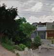 A vítima caiu em um córrego na Rua Campo Mourão, no bairro dos Pimentas, em Guarulhos (SP)  Foto: Reprodução Google Street View / Estadão