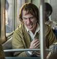 Joaquin Phoenix e Mandela Bellamy em 'Coringa' (2019); filme lidera lista de indicações do Oscar 2020  Foto: IMDB/ Niko Tavernise - © 2019 Warner Bros. Entertainment Inc. / Reprodução