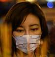 Woman wearing face mask  Foto: AFP / BBC News Brasil
