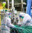 Paciente com pneumonia causada por novo coronavírus é tratado em hospital em Wuhan
28/01/2020
China Daily via REUTERS  Foto: Reuters