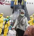 Indonésios evacuados de Wuhan, na China, centro do surto de coronavírus  Foto: EPA / Ansa - Brasil