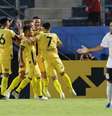 Jogadores do Guaraní comemoram o gol da vitória.  Foto: Jorge Adorno / Reuters