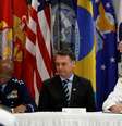 O comandante Craig S. Faller, do Comando Sul dos EUA, durante cerimônia de assinatura de acordo, ao lado de Bolsonaro, em Miami  Foto: Marco Bello / REUTERS