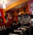 Garçonete assiste TV em restaurante vazio em Buenos Aires
18/03/2019
REUTERS/Agustin Marcarian  Foto: Reuters