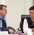 Bolsonaro criticou 'alarmismo' no combate ao coronavírus, ao lado do ministro da Saúde, Luiz Henrique Mandetta  Foto: Isac Nóbrega / PR