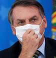 Presidente Jair Bolsonaro utiliza máscara de proteção contra coronavírus durante coletiva de imprensa 
18/03/2020
REUTERS/Adriano Machado  Foto: Reuters