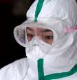 Agente de saúde com roupa de proteção aguarda resultado de exames para Covid-19 em Wuhan, epicentro da doença na China
28/03/2020
REUTERS/Aly Song  Foto: Reuters