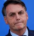 Bolsonaro em coletiva após demissão de Mandetta; para analistas ouvidos pela reportagem, presidente já não tem forças para mudar o rumo do país na condução de pandemia  Foto: REUTERS/Adriano Machado / BBC News Brasil
