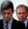 Ministro da Economia, Paulo Guedes, chega a coletiva de imprensa no Palácio do Planalto com o então ministro da Justiça Sergio Moro
31/03/2020
REUTERS/Ueslei Marcelino  Foto: Reuters