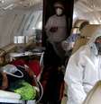 Indígena Tikuna no interior de avião após ser transferido de Tabatinga para Manaus
18/05/2020
REUTERS/Bruno Kelly  Foto: Reuters