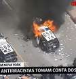 GloboNews exibiu ao vivo a quinta noite de manifestações resultantes da morte do segurança negro George Floyd por um policial branco  Foto: TV / Reprodução