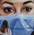 Mural de rua em Londres. Reino Unido supera 50 mil mortes entre suspeitas e confirmadas.  Foto: DW / Deutsche Welle