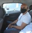 Fabrício Queiroz é visto dentro de um carro do Tribunal de Justiça do Rio (TJRJ) ao deixar o condomínio onde mora na Taquara, na zona oeste da cidade  Foto: Wilton Junior / Estadão