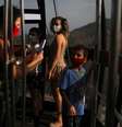Crianças visitam o Pão de Açúcar, no Rio de Janeiro, durante pandemia de Covid-19
15/08/2020
REUTERS/Pilar Olivares  Foto: Reuters