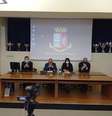 Em coletiva de imprensa, investigadores derem detalhes das prisões e do crime  Foto: ANSA / Ansa - Brasil