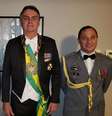 O presidente Jair Bolsonaro e o tenente-coronel Mauro Cesar Barbosa Cid  Foto: PR/Reprodução Facebook / Estadão