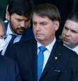 Paulo Guedes e Jair Bolsonaro  falam à imprensa após reunião com líderes partidários e de governo realizada no Palácio da Alvorada, em Brasília  Foto: Dida Sampaio / Estadão
