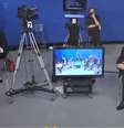 Candidatos e assessores durante debate em Campinas  Foto: Reprodução/TV Band / Estadão
