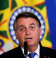 'Quando eu indico qualquer pessoa para qualquer local, eu sei que é uma boa pessoa, tendo em vista a quantidade de críticas que ela recebe em grande parte da mídia', provocou Bolsonaro  Foto: REUTERS/Ueslei Marcelino / BBC News Brasil