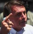 Bolsonaro fala com apoiadores com apoiadores após votar na eleição municipal, no Rio de Janerio
 29/11/2020 REUTERS/Pilar Olivares  Foto: Reuters