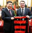 Após um primeiro momento de incerteza, por conta do discurso de campanha de Bolsonaro, relação entre Brasil e China viveu período de relativa calmaria - que duraria pouco  Foto: Yukie Nishizawa/Reuters / BBC News Brasil