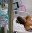 Paciente é tratado contra Covid-19 em hospital temportário em Moscou
17/11/2020
REUTERS/Maxim Shemetov  Foto: Reuters
