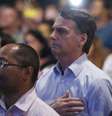 Bolsonaro e sua esposa Michelle durante um culto no Rio de Janeiro  Foto: DW / Deutsche Welle