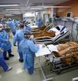 Profissionais de saúde tratam de pacientes na sala de emergência do hospital Nossa Senhora da Conceição, em Porto Alegre
11/03/2021 REUTERS/Diego Vara  Foto: Reuters