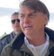Bolsonaro fala com apoiadores após passeio de moto  Foto: YouTube Foco do Brasil / Reprodução