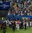 Jogadores e torcedores argentinos festejam título da Copa América  Foto: Henry Romero / Reuters