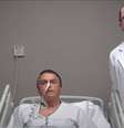 Bolsonaro posa com o médico Antônio Macedo durante entrevista  Foto: Reprodução/RedeTV