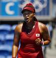 Naomi Osaka comemora ponto conquistado durante seu jogo de estreia na Olimpíada  Foto: Kyodo/Reuters 