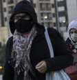 Pedestres enfrentam frio intenso na zona sul da cidade de São Paulo, na manhã desta quinta-feira  Foto: BRUNO ROCHA/ENQUADRAR / Estadão Conteúdo