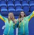 Tenistas brasileiras recebem bronze e se emocionam no pódio  Foto: Geoff Burke / Reuters