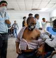 Homem recebe vacina contra Covid-19 em Noida, nos arredores de Nova Délhi
30/08/2021 REUTERS/Adnan Abidi  Foto: Reuters