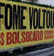 'A fome voltou', diz cartaz de protesto na Avenida Paulista, em São Paulo  Foto: Roberto Parizotti/Fotos Públicas / BBC News Brasil