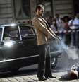 Gravação do filme francês "Les Lyonnais", 2010, em cena em que homem atira contra outro  Foto: AFP / BBC News Brasil