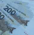 Alta da inflação, junto a incerteza quanto a controle fiscal pelo governo federal, fazem acelerar a alta da taxa de juros  Foto: Reuters / BBC News Brasil