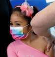 Criança recebe dose da vacina contra Covid-19 CoronaVac em escola pública em Concón, no Chile
27/09/2021 REUTERS/Rodrigo Garrido  Foto: Reuters
