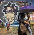 Mural sobre pandemia em Johanesburgo, na África do Sul, país onde foi descoberta a variante Ômicron  Foto: EPA / Ansa - Brasil