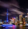A riqueza gerada pela China no início do século 21 está exposta em suas grandes cidades, como Xangai  Foto: Kevin Frayer/Getty Images / BBC News Brasil