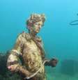 Estátua no parque arqueológico submarino de Baia, na Itália  Foto: ANDREAS SOLARO/AFP via Getty Images / BBC News Brasil