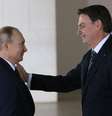 Embora Putin e Bolsonaro exibam ao mundo uma admiração mútua e afinidade nos modos de governar, há também grandes diferenças em suas jogadas no tabuleiro internacional  Foto: Getty Images / BBC News Brasil