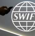 O Swift foi criado em 1973, por bancos de vários países, para facilitar transações internacionais  Foto: Reuters / BBC News Brasil