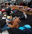 Refugiados ucranianos na Polônia   Foto: Olivier Douliery / Reuters